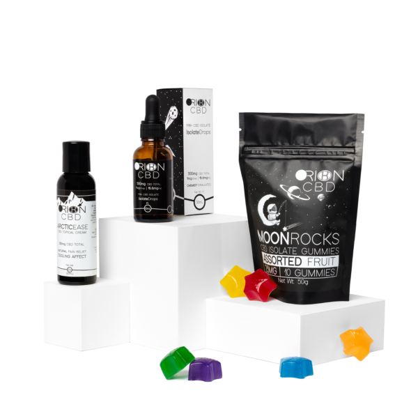 Orion CBD Beginner Bundle featuring Isolate Drops, Arctic Ease Cream, and Moonrock Gummies on white blocks with assorted fruit flavors laid out